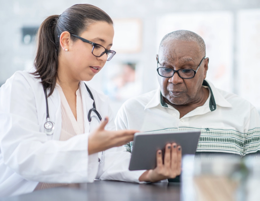 Two people reviewing a document – Medicare supplement agents Staten island medicare drug coverage
