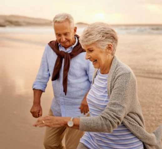 medigap2 Elderly Couple frolicking's on beach - Medigap Plans