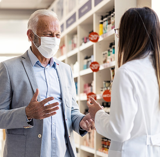 Man speaking with doctor medicare drug plans